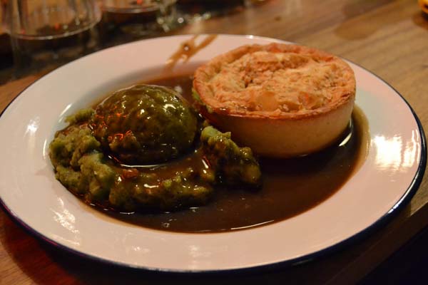 Beef pie and pea mash - a classic English food dish in Oxford