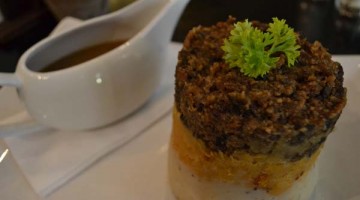 Scottish food - Mashed turnip, potato and haggis with whiskey sauce